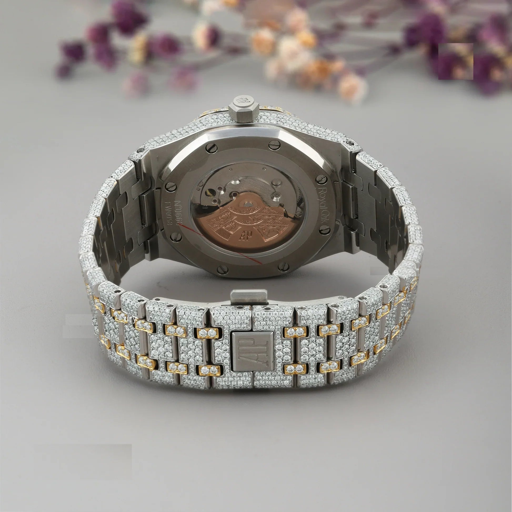 Lux Watches diamond encrusted stainless steel watch with two tone gold links and exhibition caseback showing movement